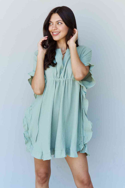 Stepping Out Ruffle Hem Dress with Drawstring Waistband in Light Sage