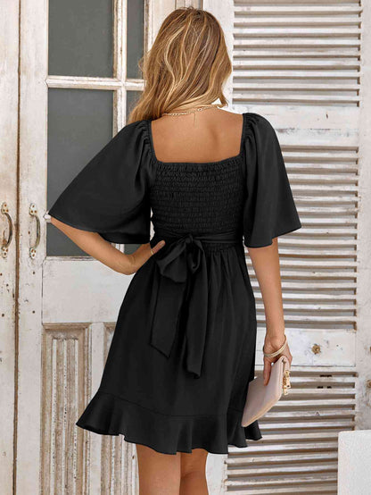 It’s a Wrap Smocked Tie Back Ruffle Hem Dress